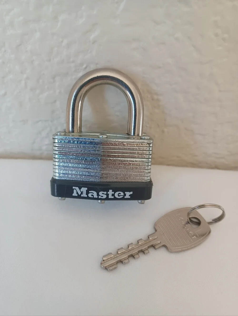 Master Lock Laminated Steel Warded Padlock with Key